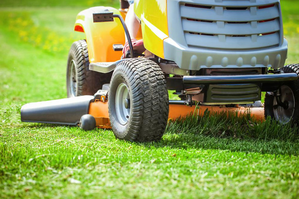 John Deere’s riding lawn mowers